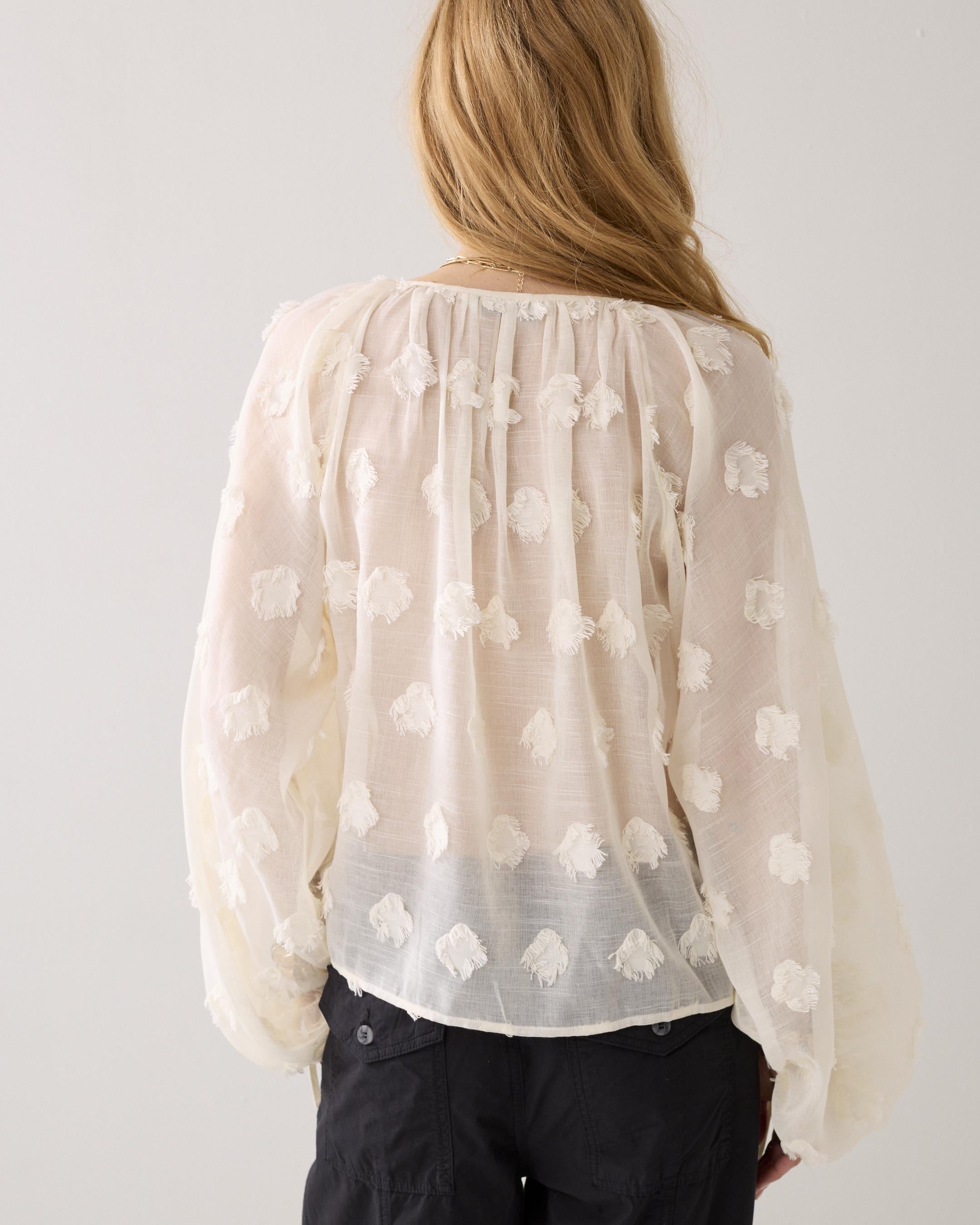 Strukturierte Bluse mit floralen Akzenten in zwei Farben