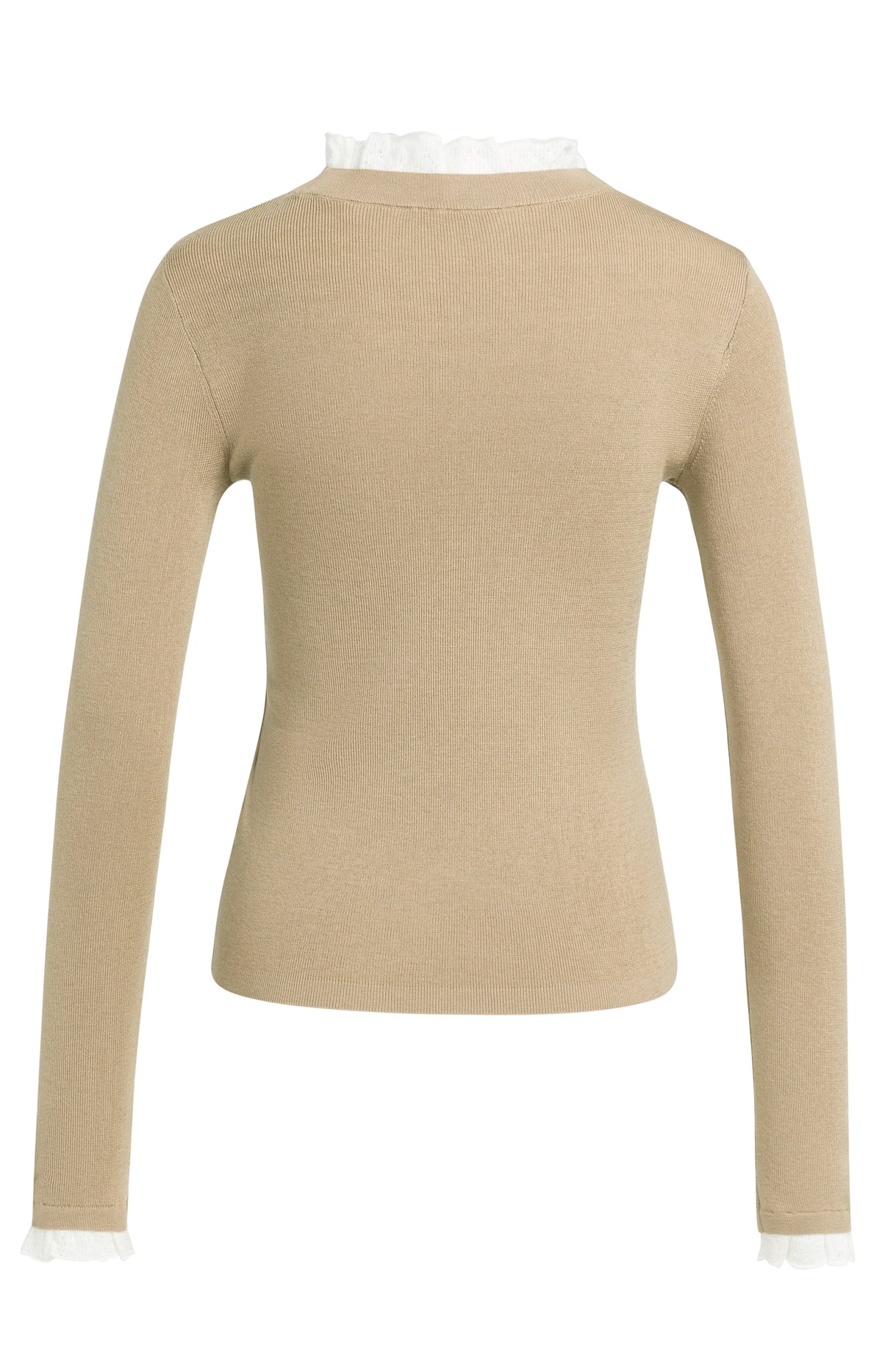 Das Strickoberteil mit Rüschendetails