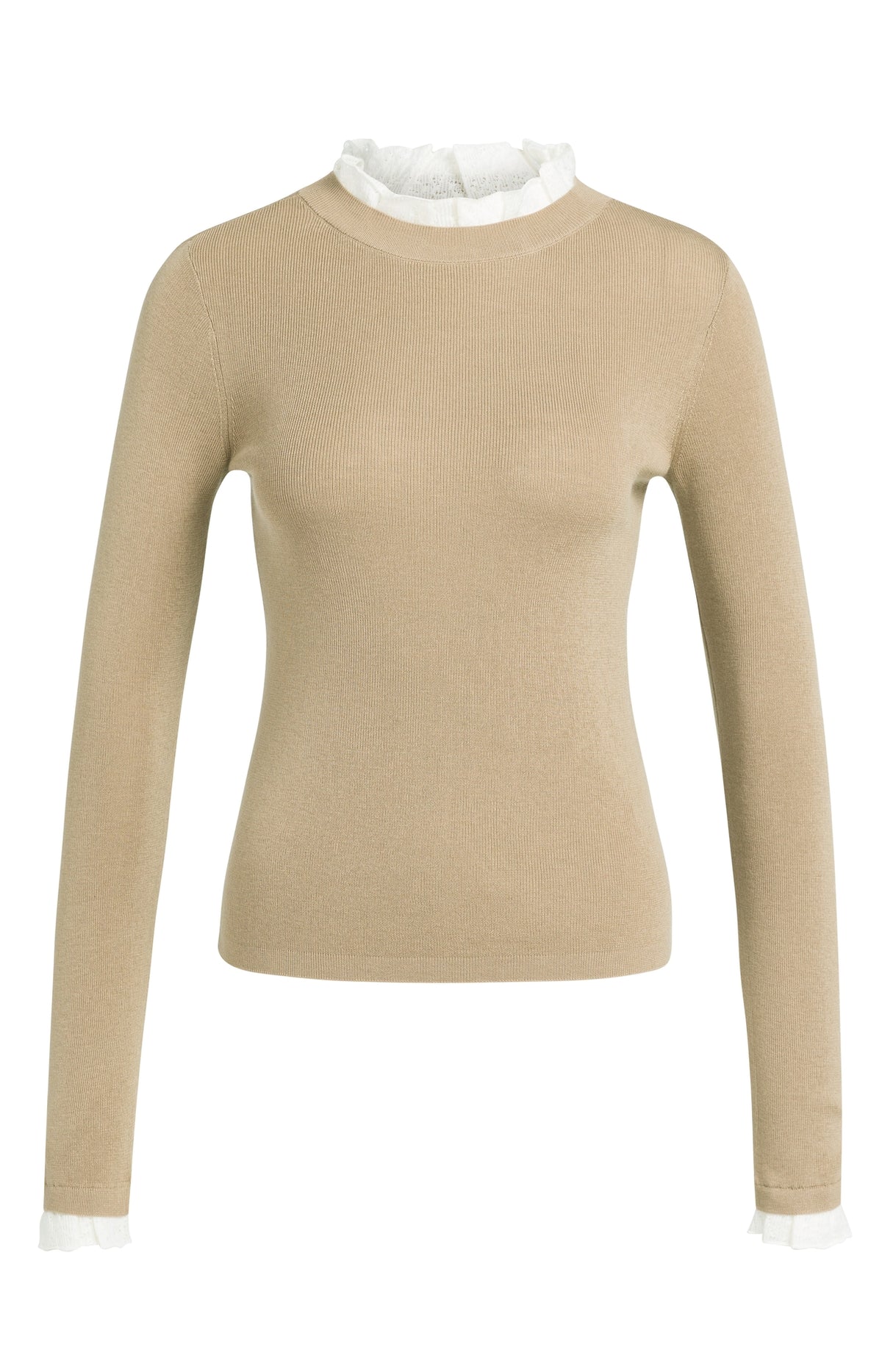 Das Strickoberteil mit Rüschendetails