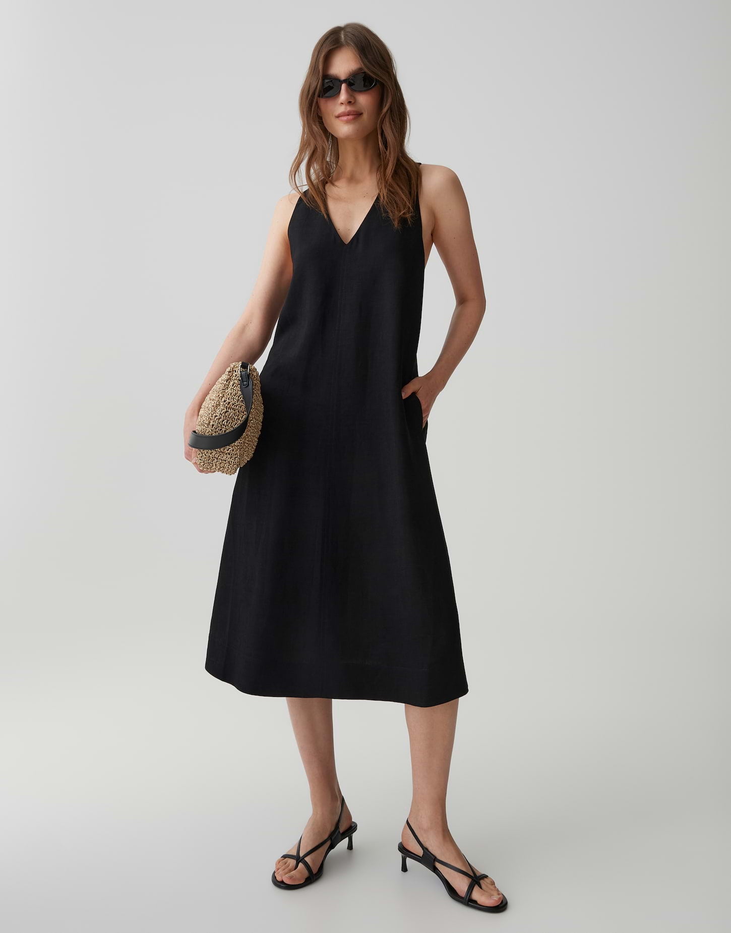 Zeitloser Leinen-Chic mit Rückendetail