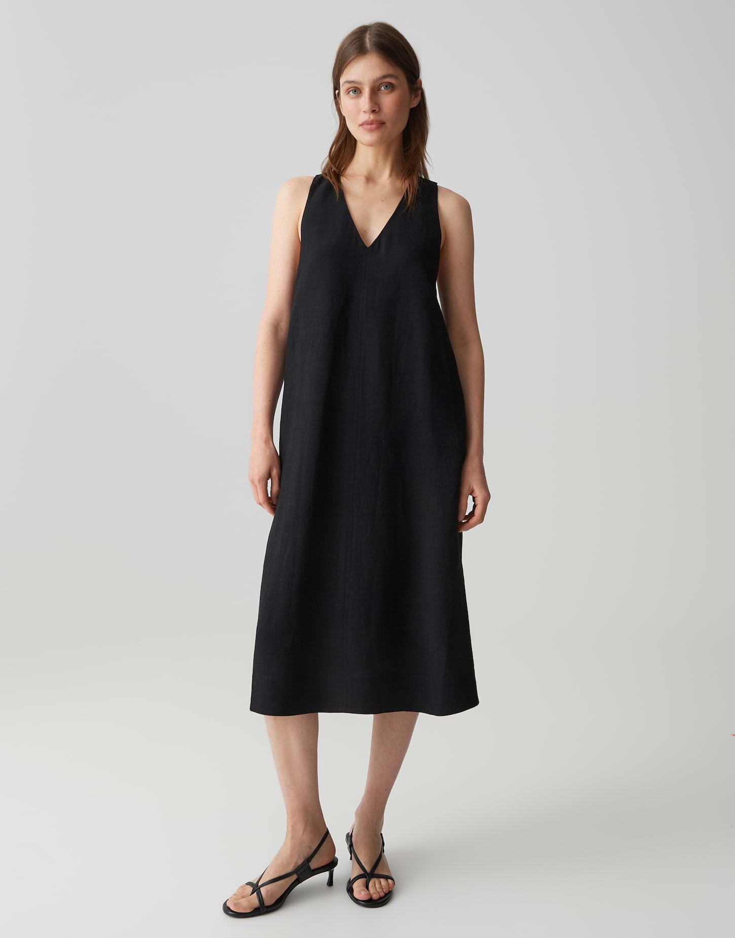 Zeitloser Leinen-Chic mit Rückendetail