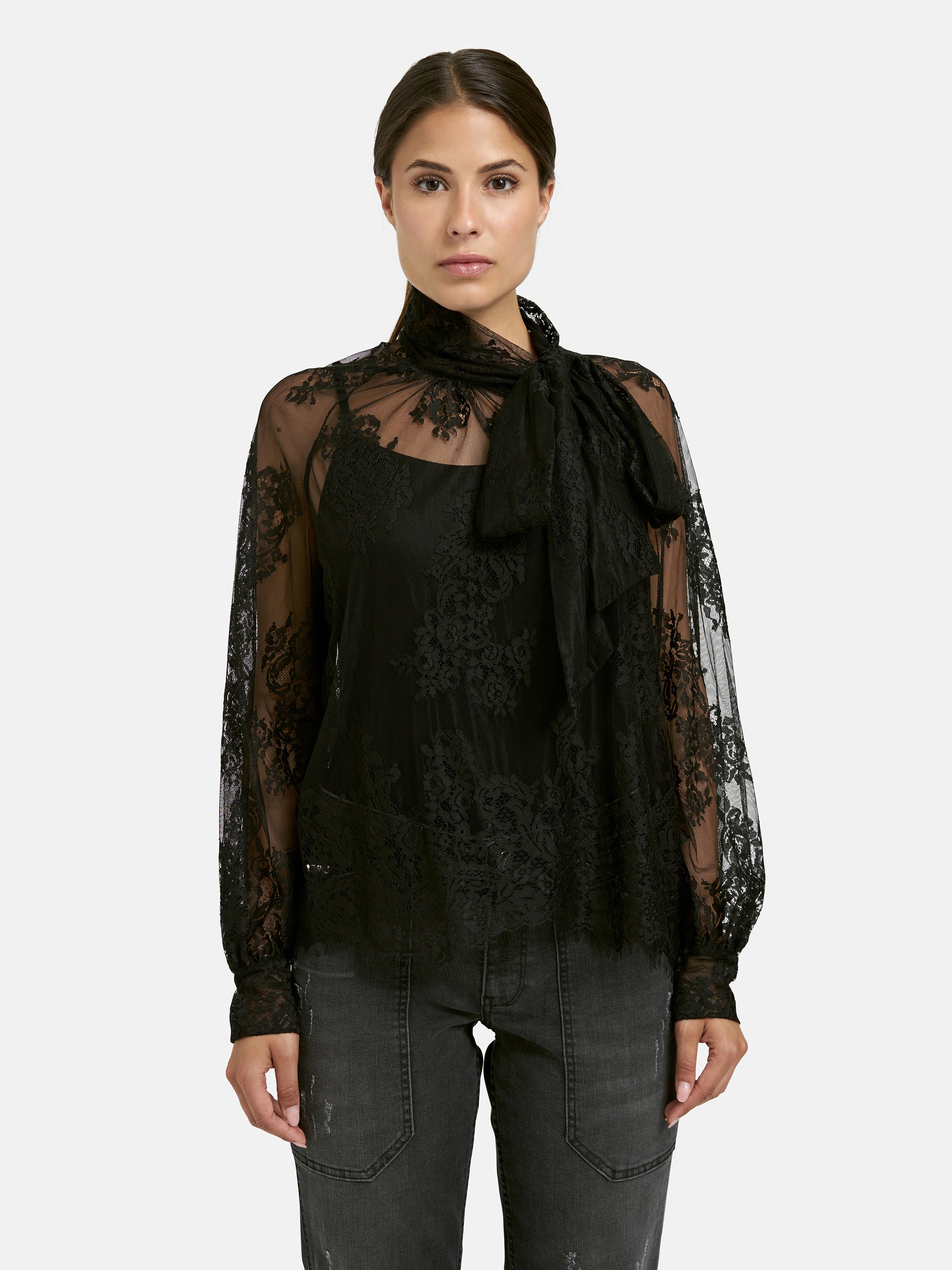 Elegante Spitzenbluse mit langen Ärmeln und Schluppe
