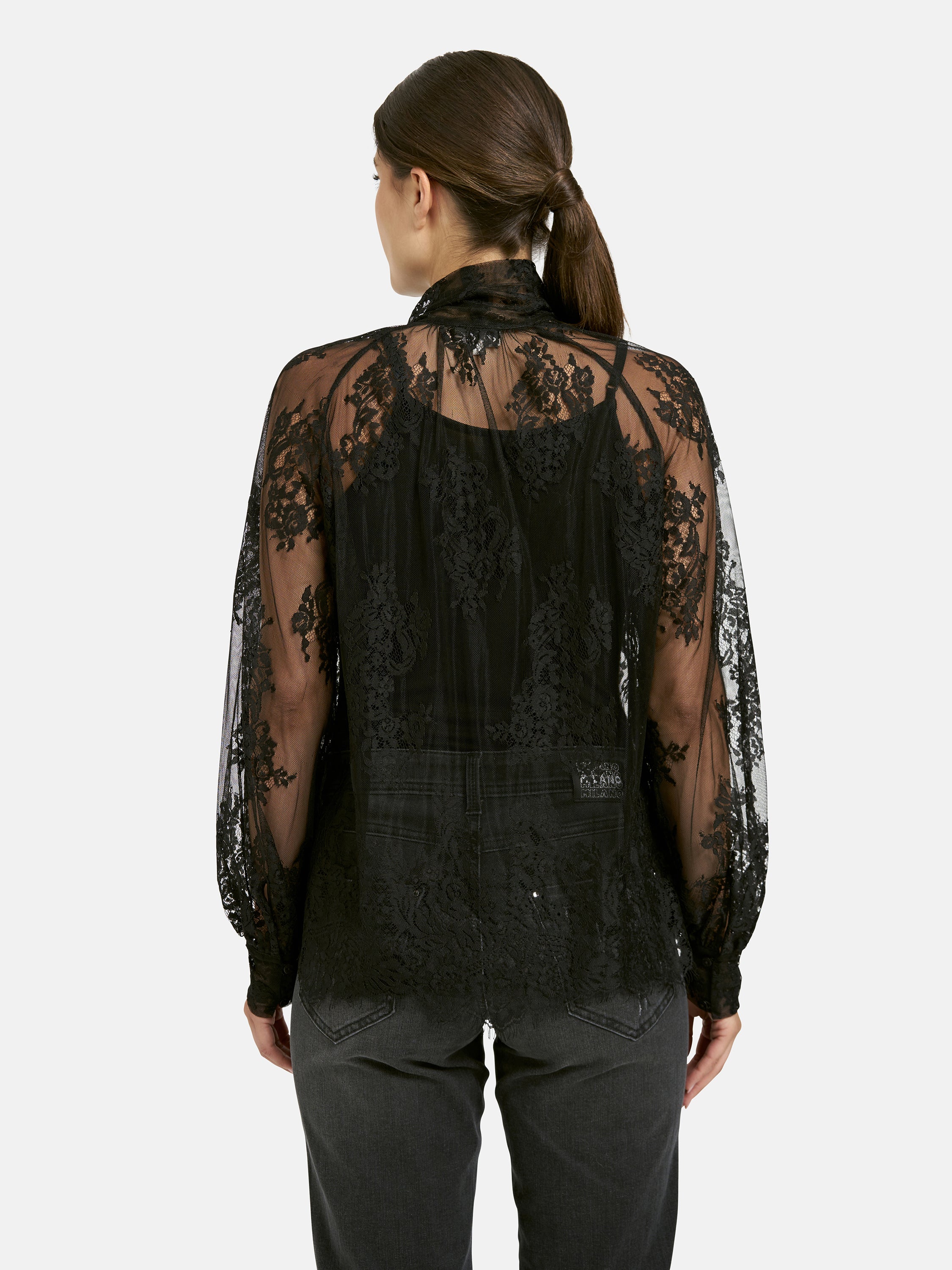 Elegante Spitzenbluse mit langen Ärmeln und Schluppe