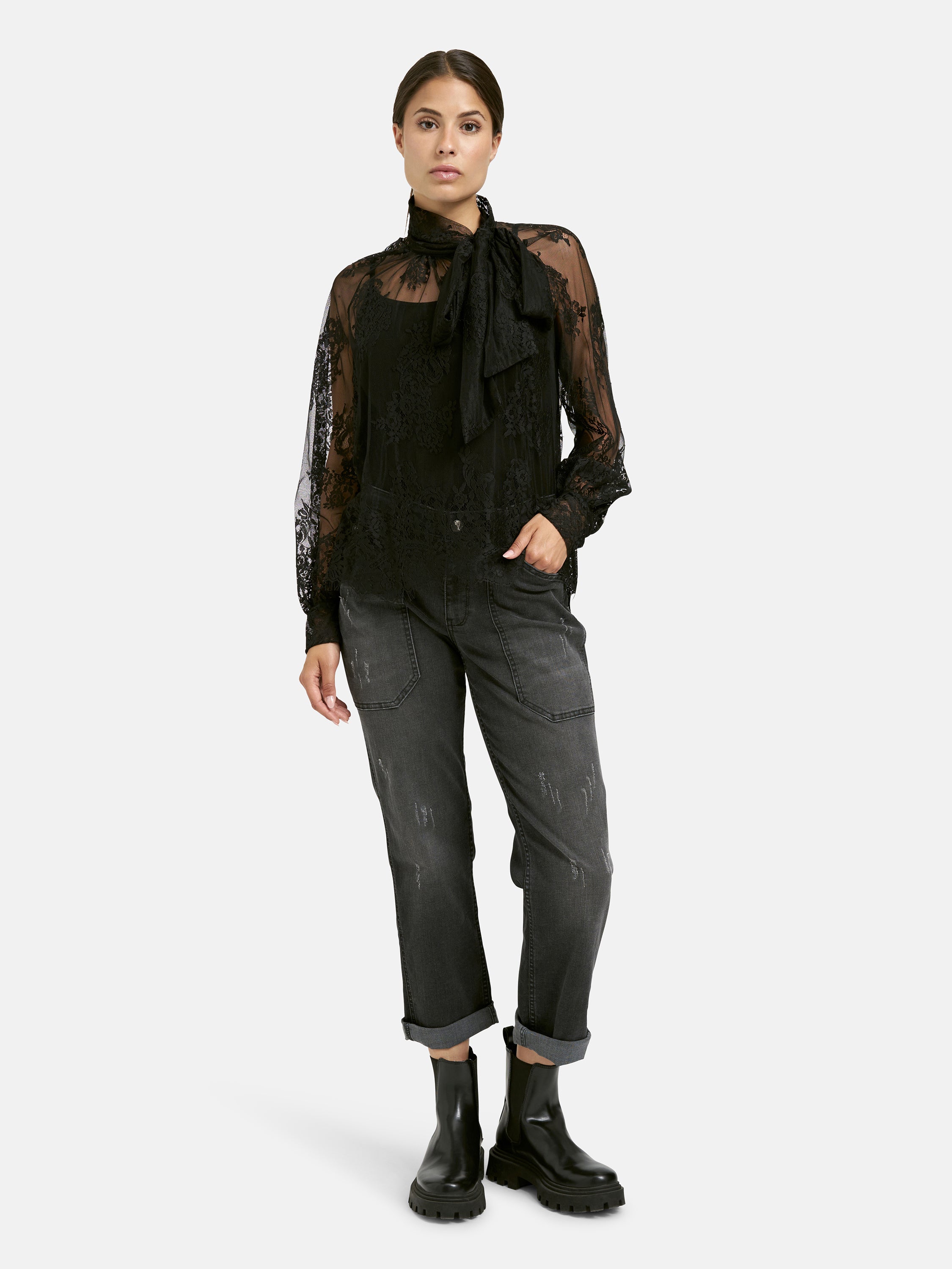 Elegante Spitzenbluse mit langen Ärmeln und Schluppe