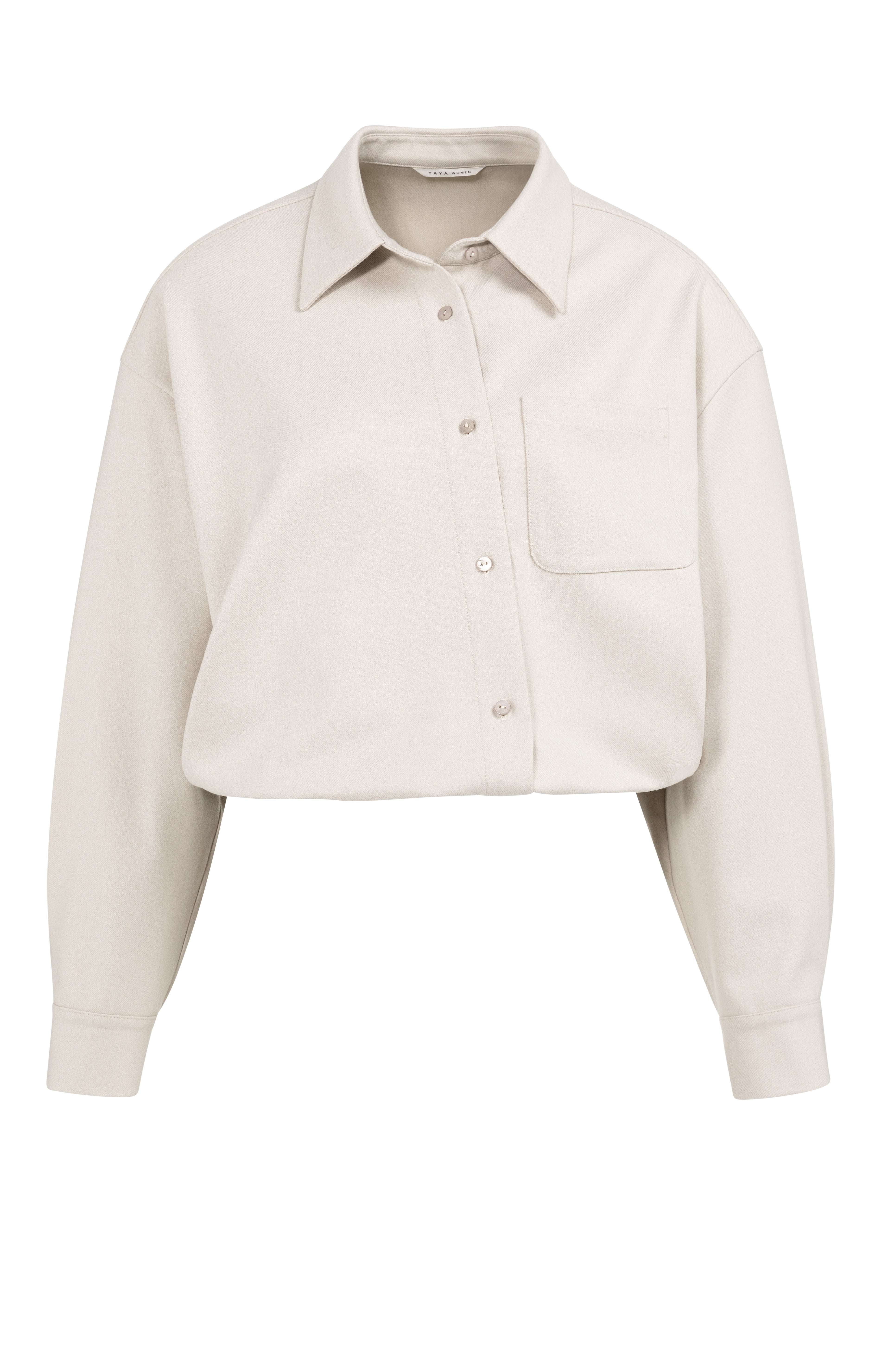 Lässig-schick in Oversize Bluse mit asymmetrischer Leist